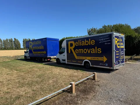 Two Reliable Removals vans parked up on a job in the Sussex countryside