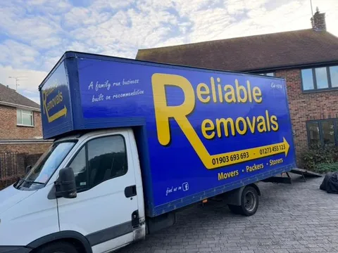 Reliable Removals Luton van on a driveway ready to load